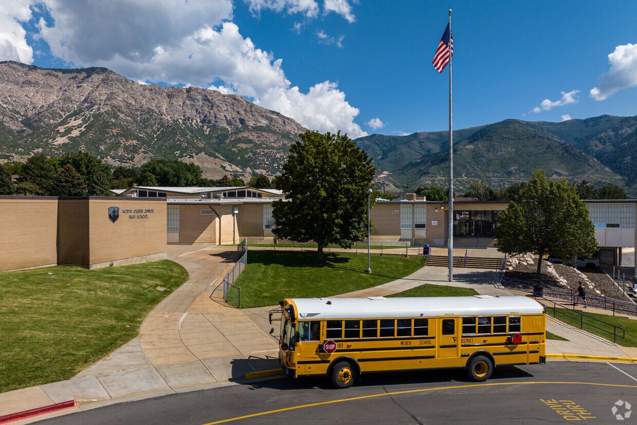 North Ogden Jr High School front view with yellow bus 